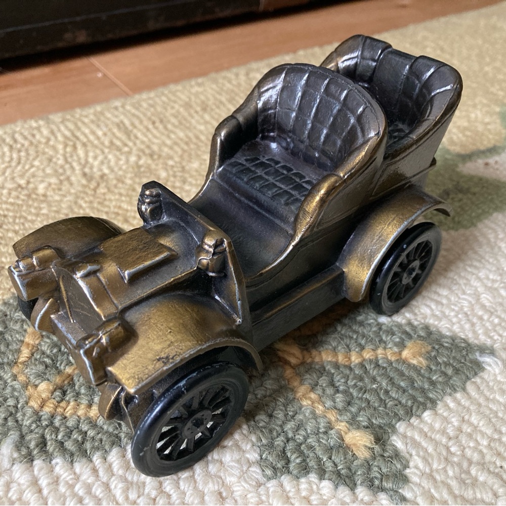 Vintage 1906 Oldsmobile car coin bank